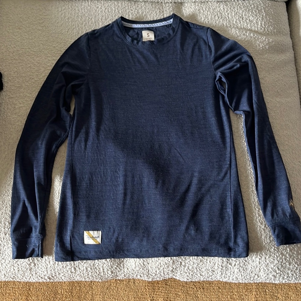 Tracksmith blue harrier top